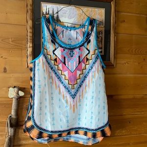 Sheer wester looking silky tank top.